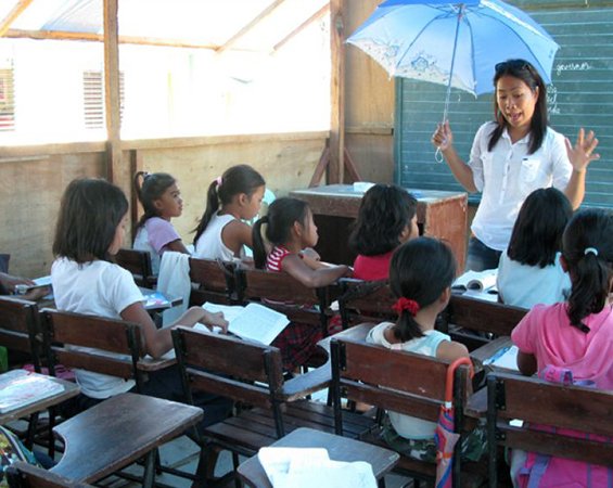 A photo of a dark, short-haired young female child with dark eyes from the Phillippines, representing global programs established by the d3h Foundation to fulfill d3h hotel's corporate social responsibilty initiatives.